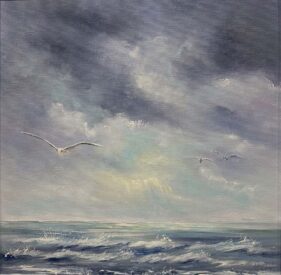 choppy seascape with stormy skies and seagulls