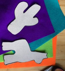 stack of felt and the two cut out templates of cactus and llama