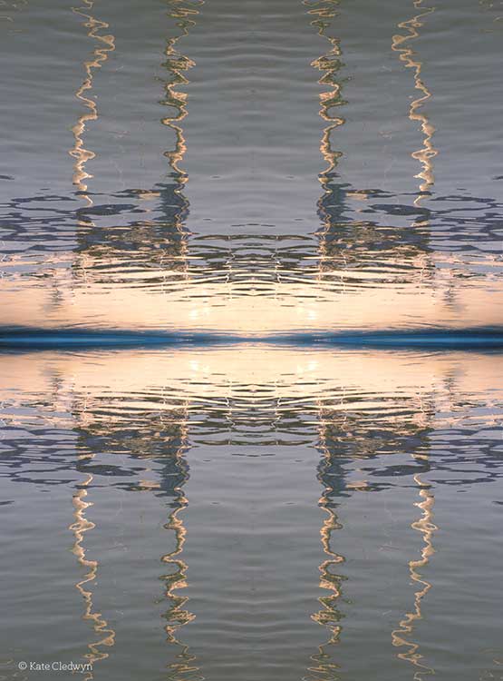 sky reflected in water by Kate Cledwyn