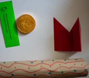 materials for cracker, paper, tissue paper hat, joke and chocolate coin