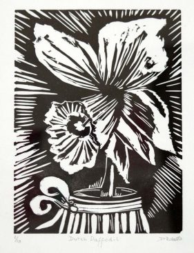 black and white linocut outline of daffodil head in vase