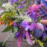 bunch of freshly picked pink, purple and white flowers