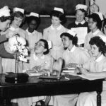 Black and white photograph from 1960s showing nurse training