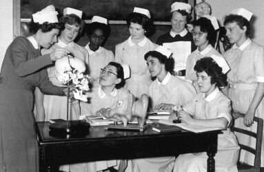 Black and white photograph from 1960s showing nurse training