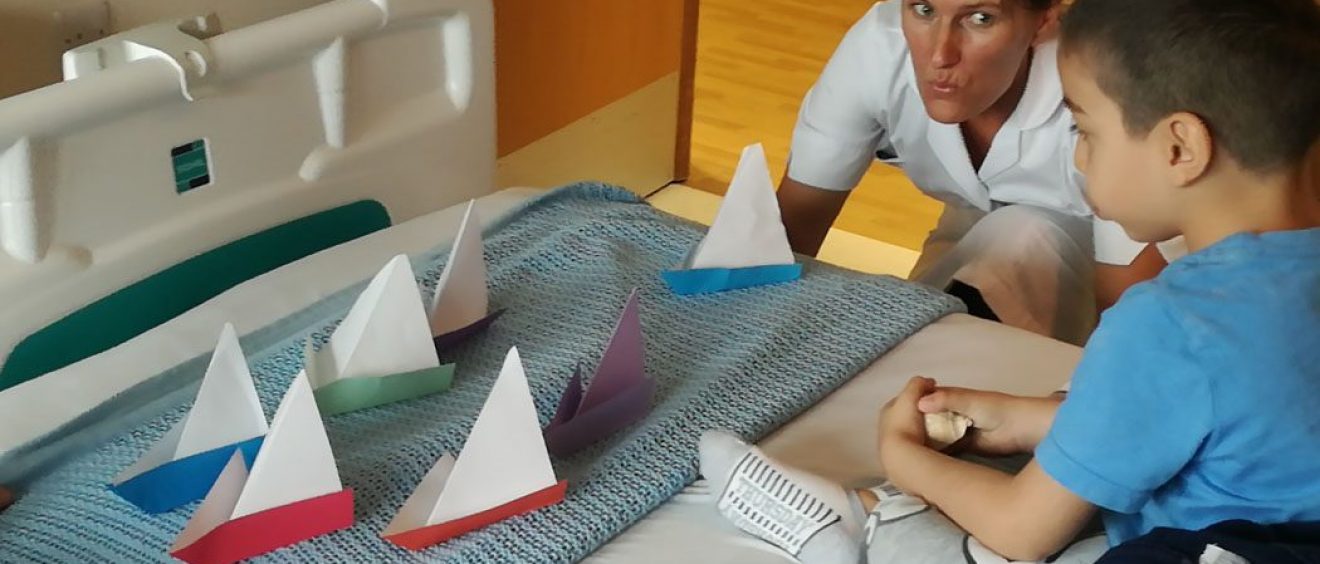 Origami boats on patients bed