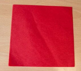 red tissue paper square