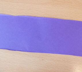 rectangle piece of purple card