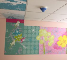 Abstract pattern and flower shapes design - wall vinyl continuing into ceiling tiles