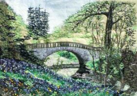 stone arch bridge over stream, yellow and blue wild flowers on bank, trees surround using fabric and machine embroidery