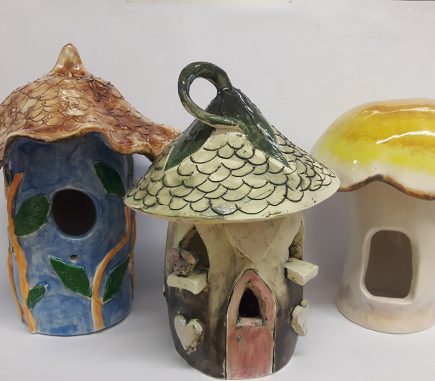 ceramic mushroom style bird houses, painted and glazed