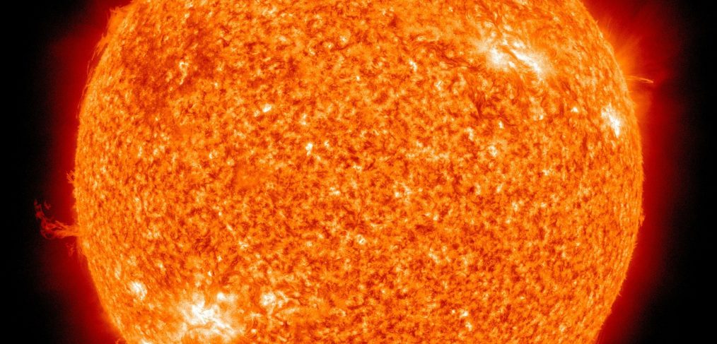 orange fiery surface of sun revealed up close