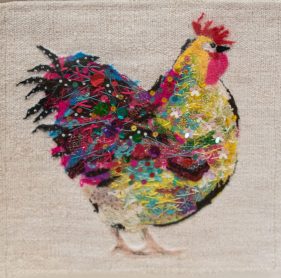 textile cockerel made of stiches and brightly coloured sequins