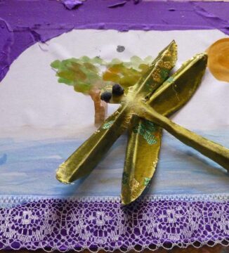 fabric dragonfly on collage background by well city participant