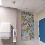 orchard print next to sink panel on ward