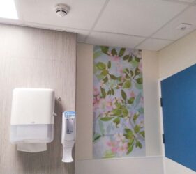 orchard print next to sink panel on ward