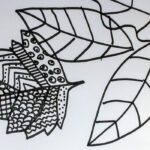 outline of leaf shapes in black pen, filled in with zigzag lines and dots